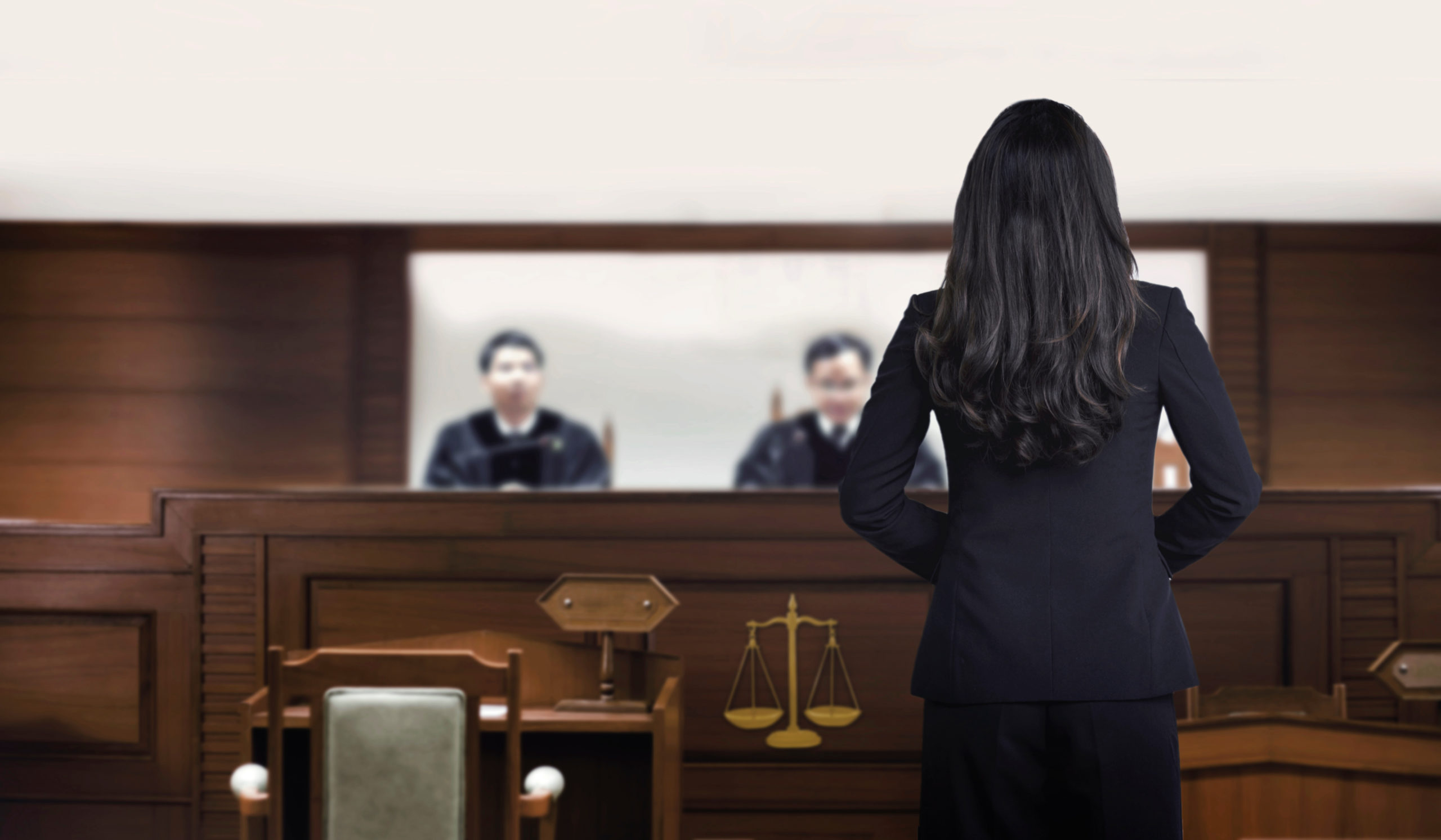Courtroom attastor talking to magistrate