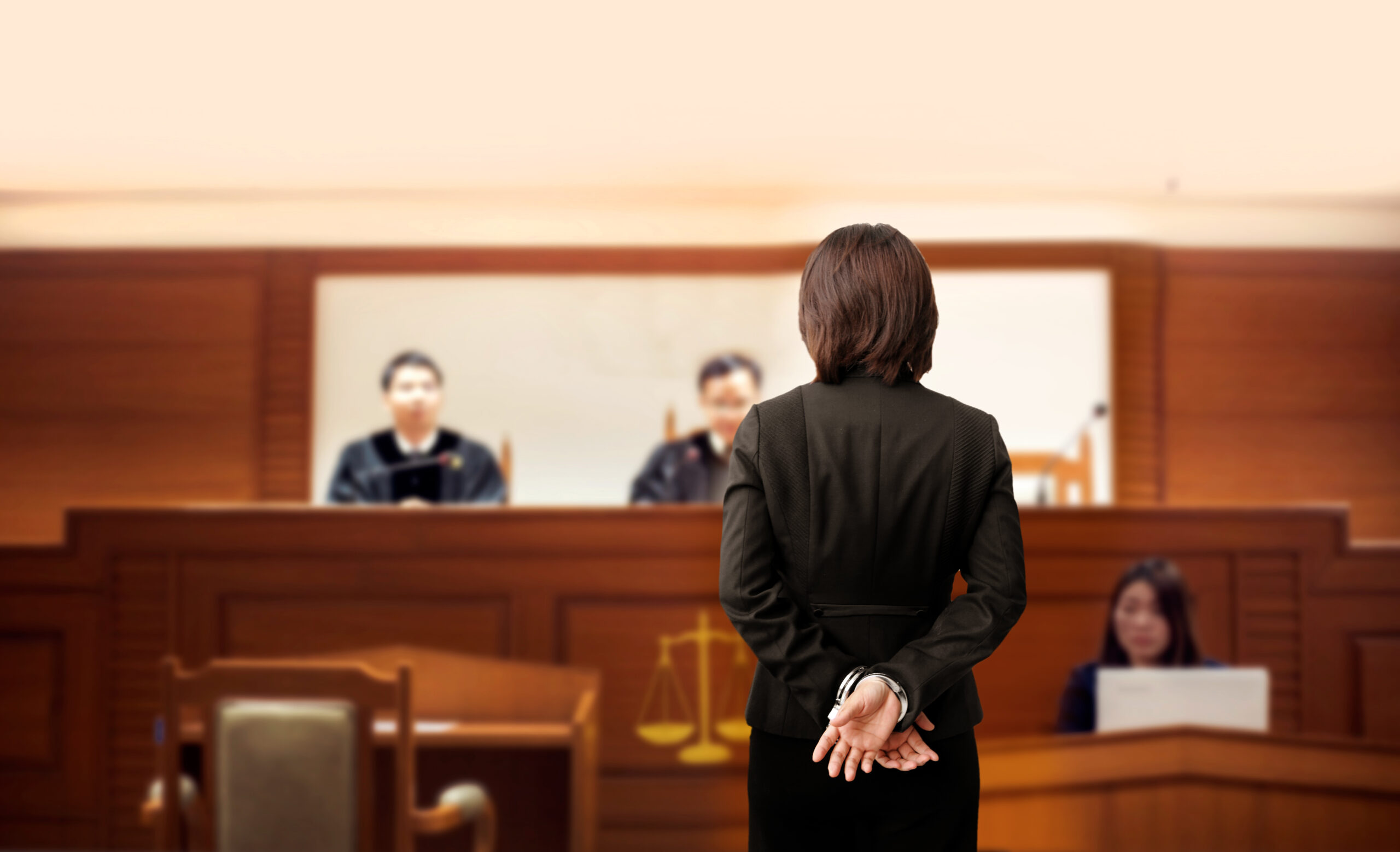 Prisoner is handcuffed in the trial court in front of the judge